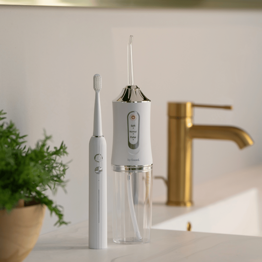 

Oral Care sæt - Water flosser + Elektrisk tandbørs